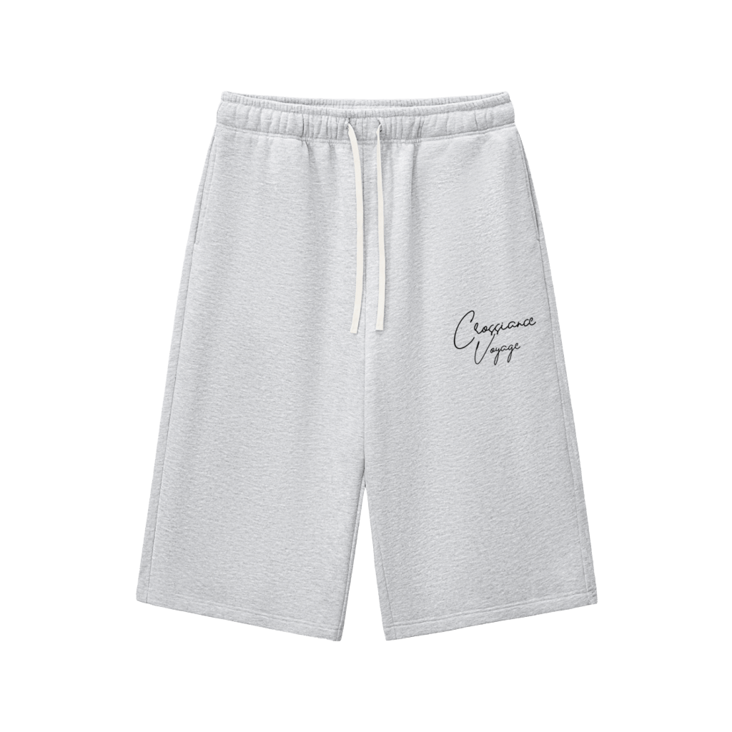 Moonlight Three-Quarter Shorts front view — light grey unisex drawstring sweatpant shorts with Croissance Voyage script logo